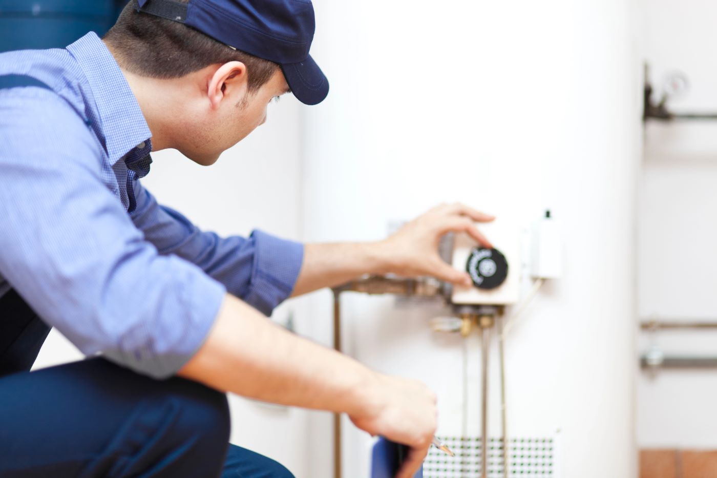 Water heater replacement Image of hot water heater service, featuring KDP Professional Plumbing Services and highlighting expert water heater replacement solutions.
